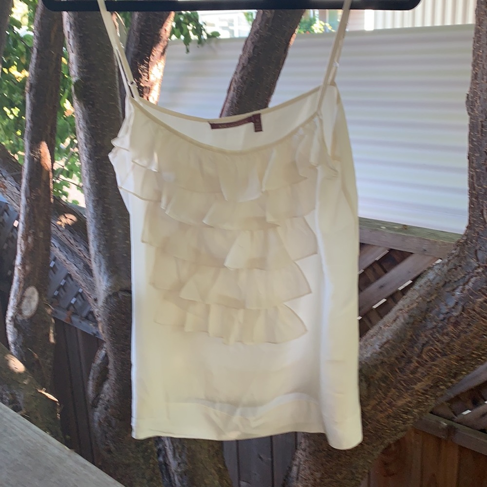 Cream color silk, ruffle camisole. Like new.